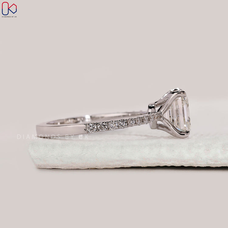 White gold diamond ring with Asscher cut stone.
