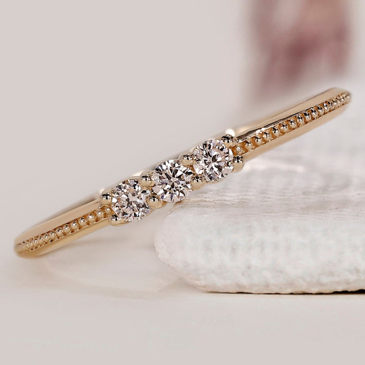 Round 3 Stone Wedding Band In Yellow Gold