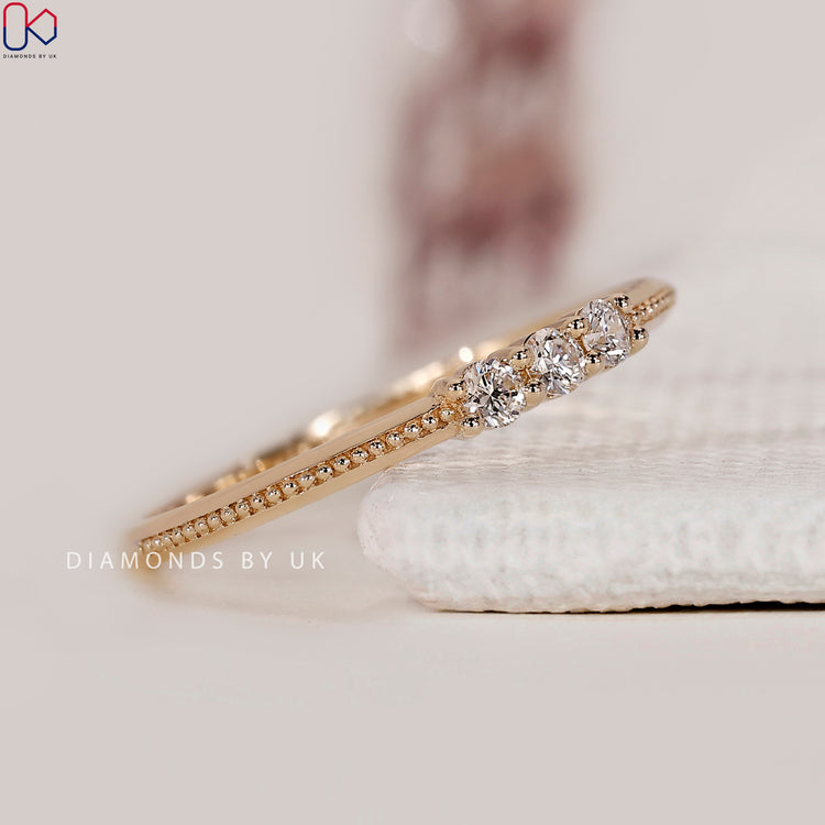 Buy wedding band in round diamond wedding band style.
