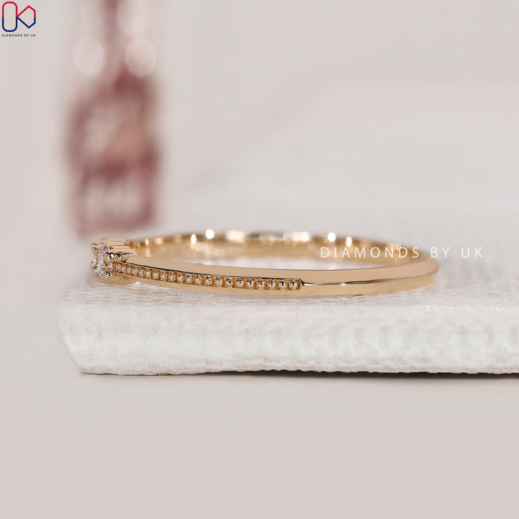 Handmade jewellery with 3 stone wedding band.
