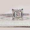 Asscher diamond engagement ring in white gold.
