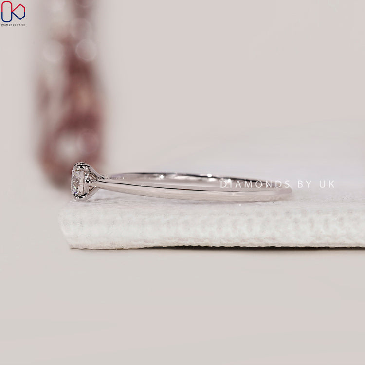 UK style solitaire diamond ring
