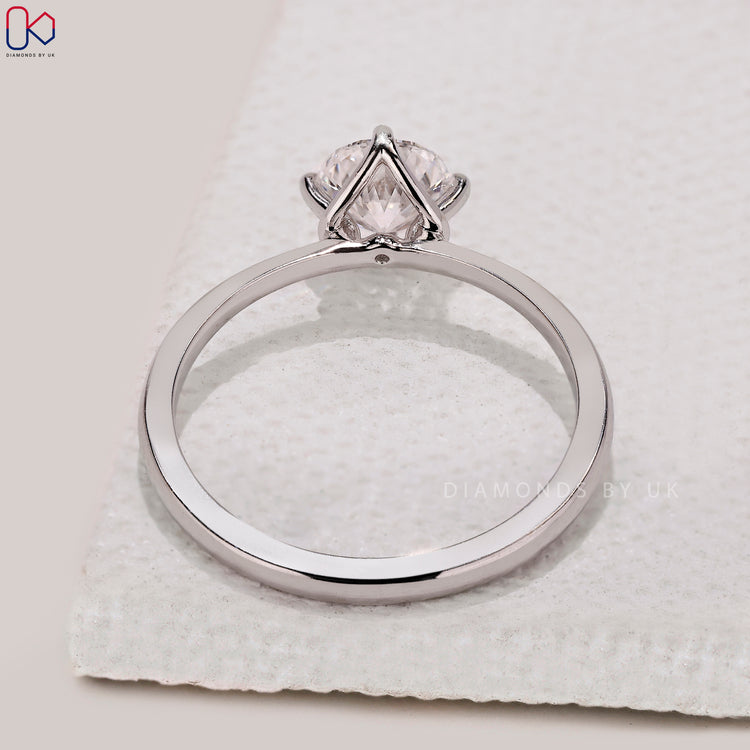 Lab grown round cut diamond engagement ring.

