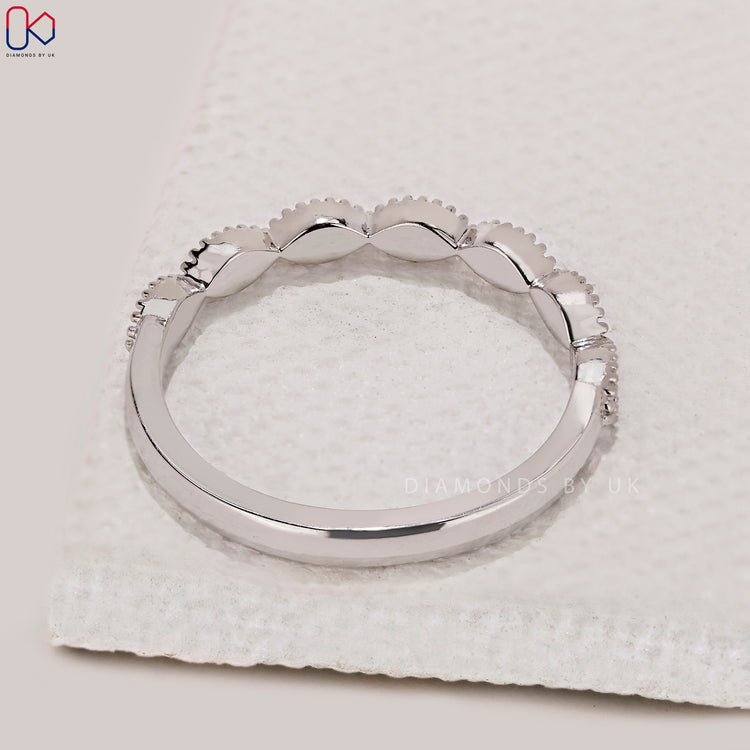 Handmade jewellery diamond wedding band.
