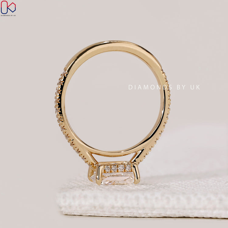 Four claw prong setting radiant cut engagement ring.
