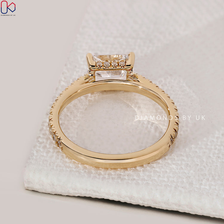 Custom diamond ring handcrafted in yellow gold.
