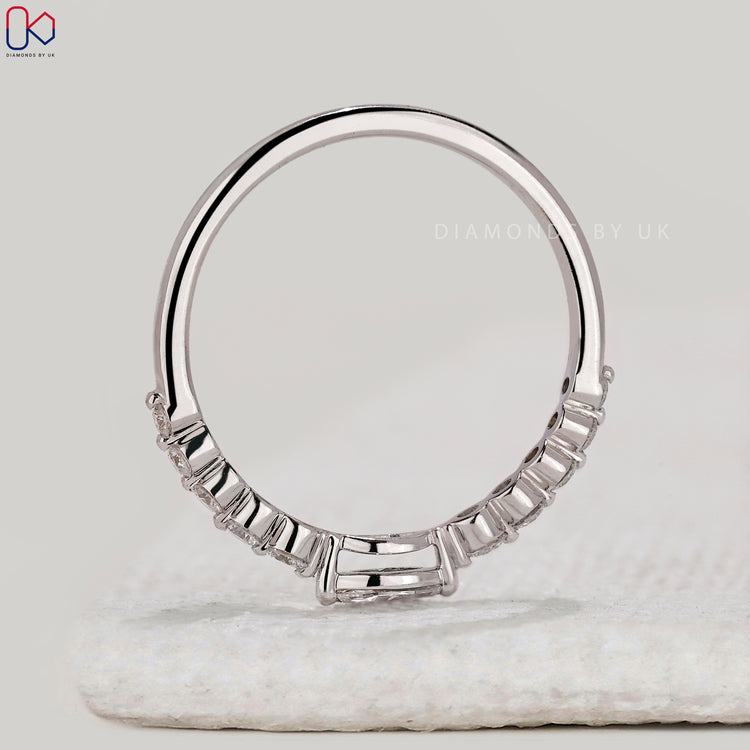 Handmade jewellery half eternity diamond band.
