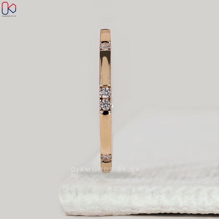 Handmade gypsy set wedding band with diamonds by Diamondsbyuk.
