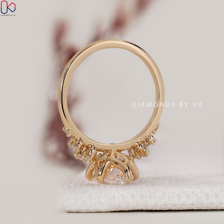 Custom diamond ring handcrafted in yellow gold.

