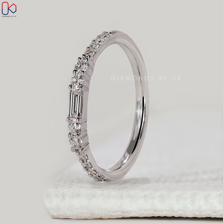 Custom diamond band with baguette and round diamonds.
