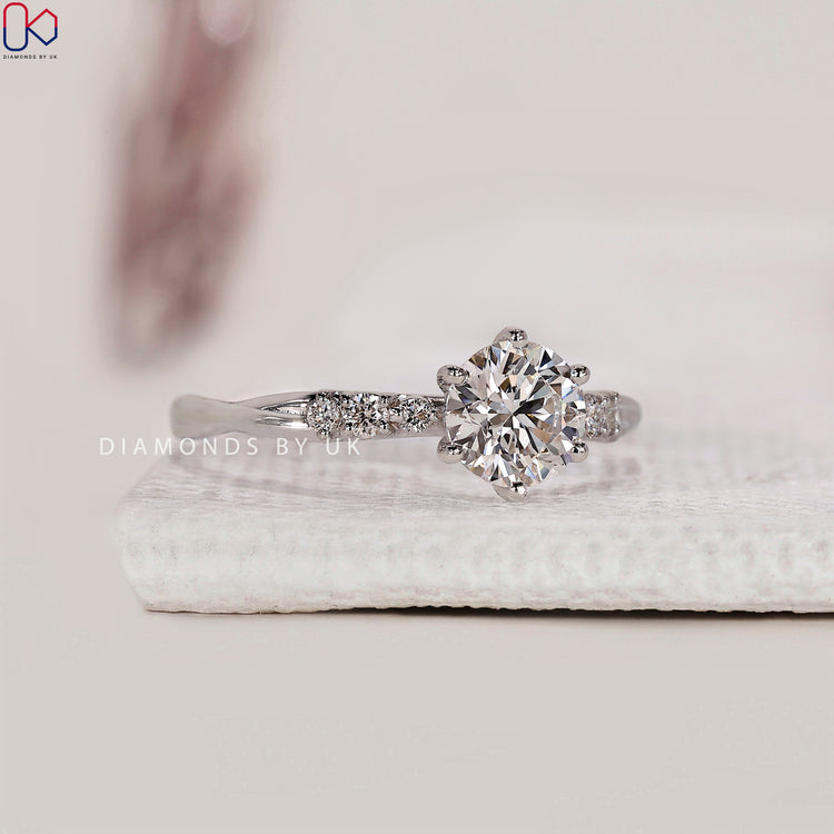 Six prong round diamond ring
