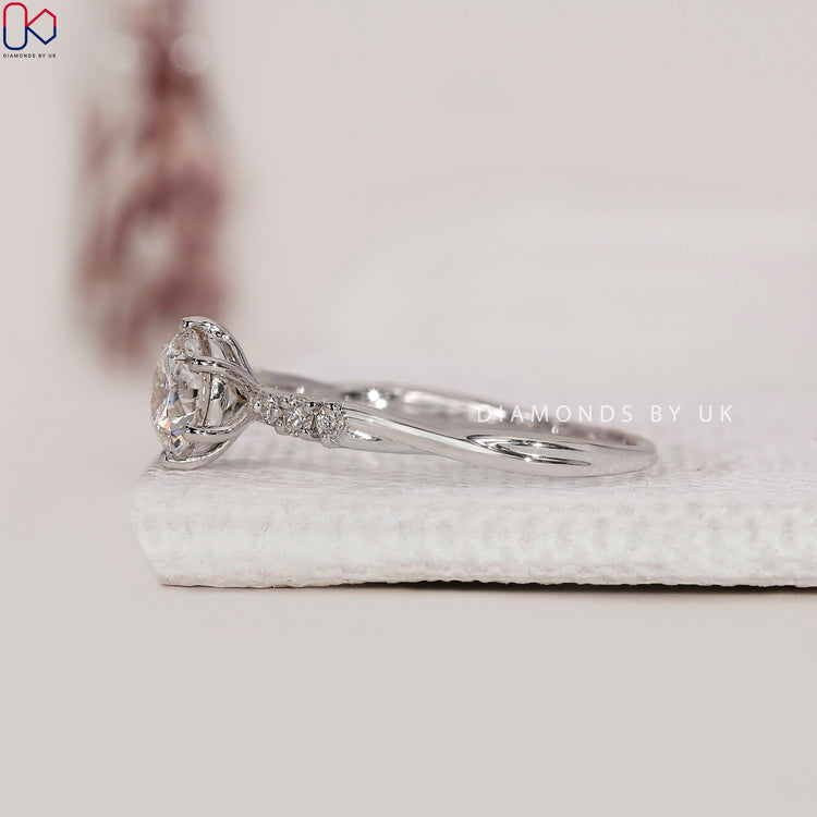 Twisted band ring with lab diamond
