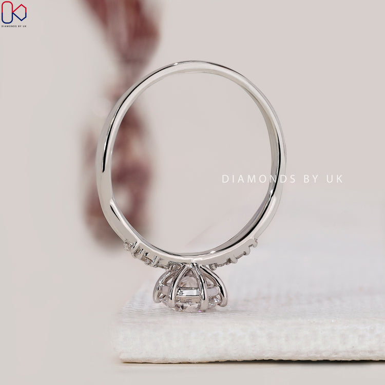 UK style round cut engagement ring
