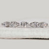Marquise diamond wedding band in white gold.
