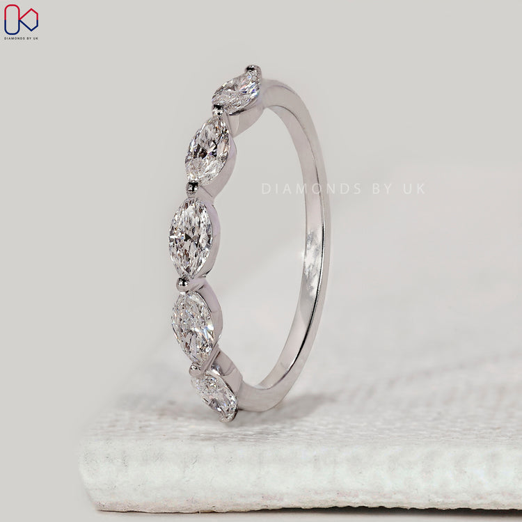 Buy wedding band in white gold.
