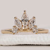 Crown wedding band with marquise and round wedding band.
