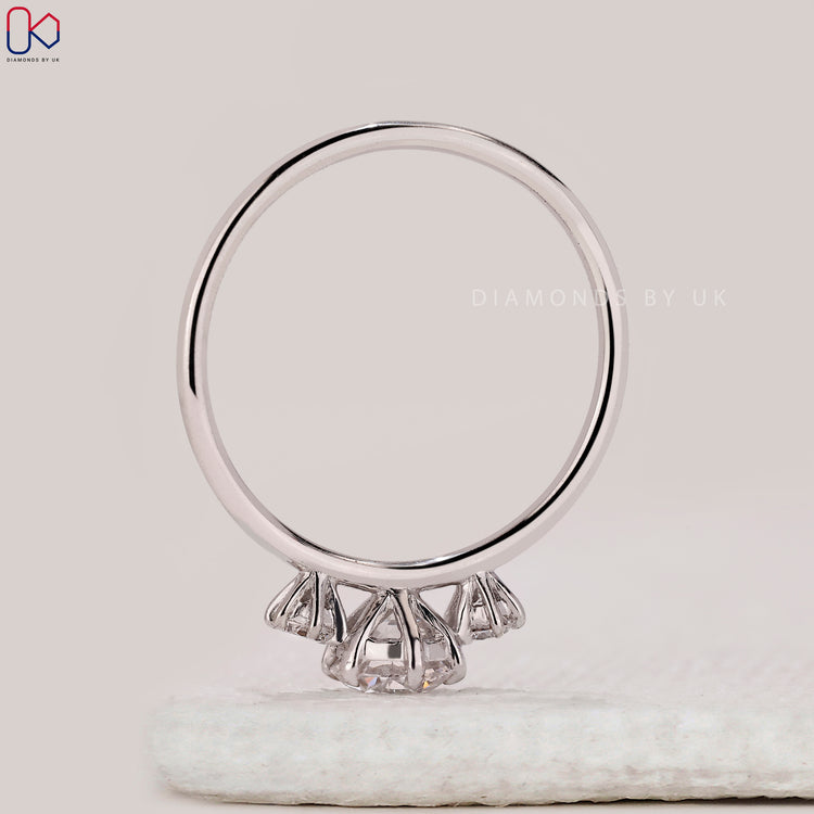 Elegant round diamond ring by Diamondsbyuk.
