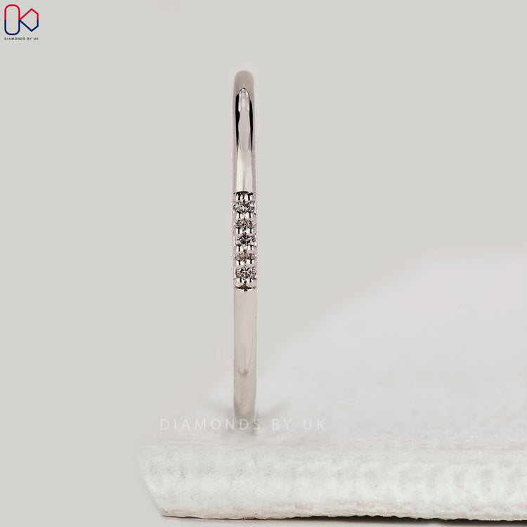 Buy wedding band in white gold.
