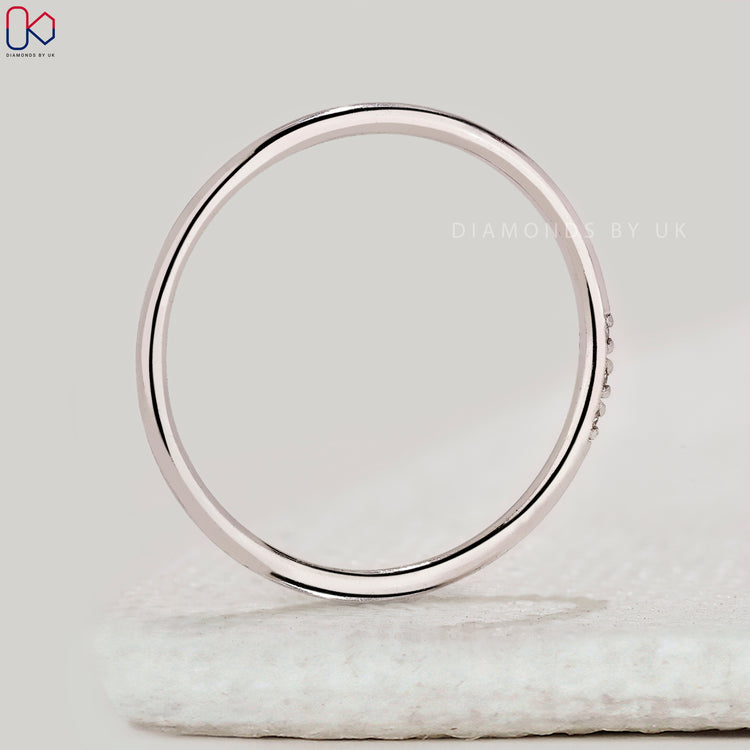 Handmade band with 3 stone diamonds.
