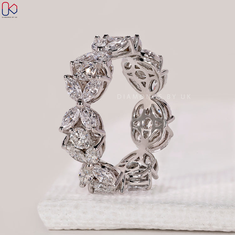 Handmade band with mixed diamond shapes.
