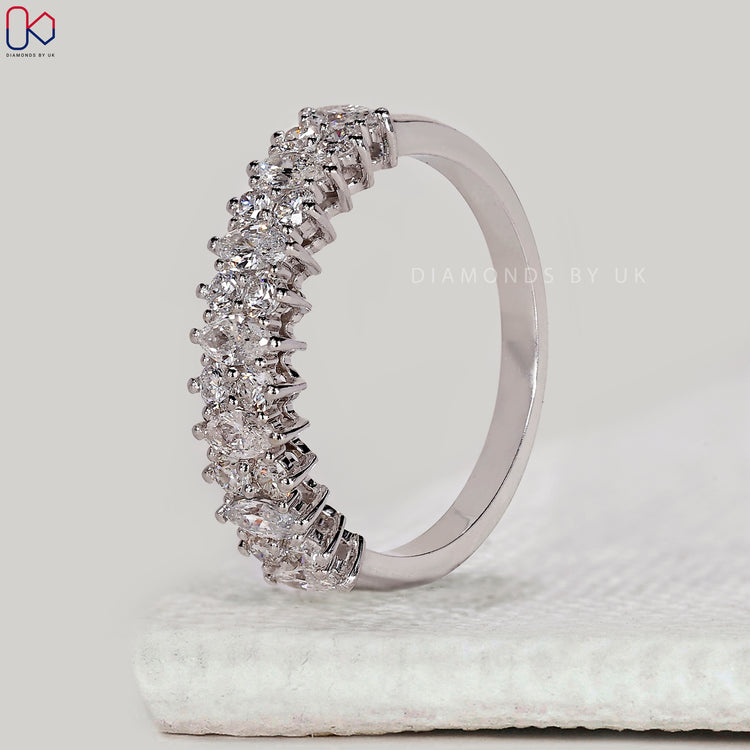 Buy white gold round and marquise wedding band online.
