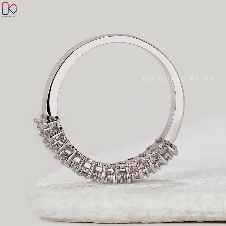 Diamondsbyuk shared prong round and marquise diamond band.
