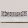 Half eternity band with diamonds.
