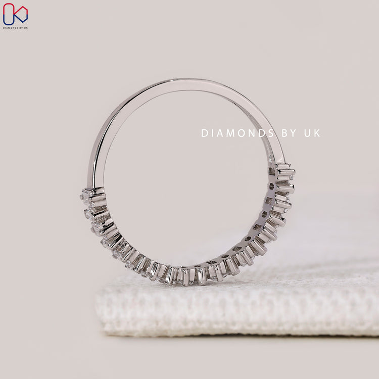 Handmade band with marquise and baguette diamonds.
