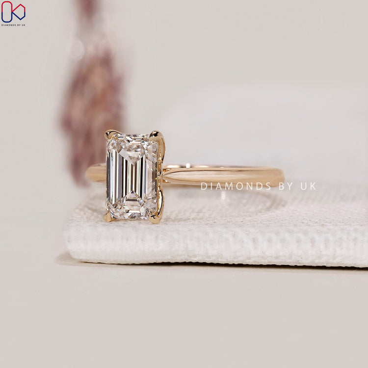 Prong set ring with a solitaire diamond.
