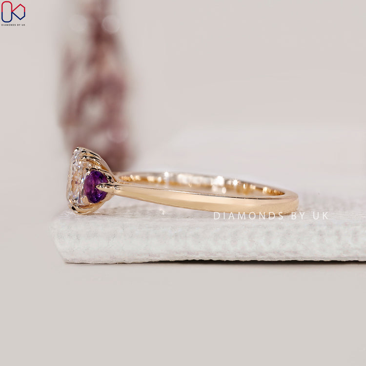 Double claw prong setting cushion cut engagement ring.
