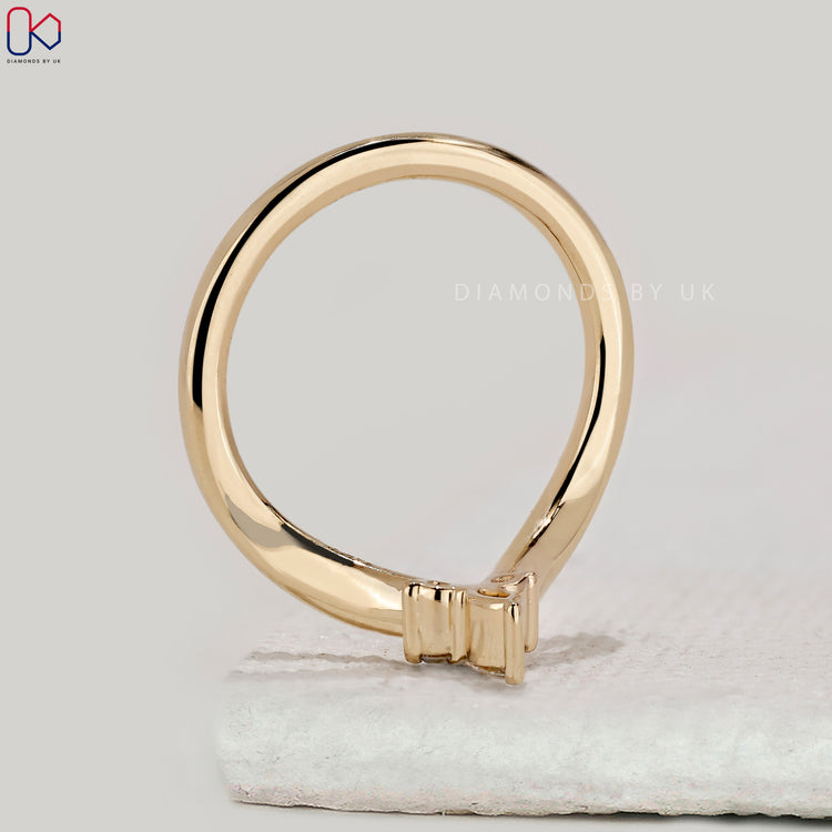 Handmade jewellery curved diamond band.
