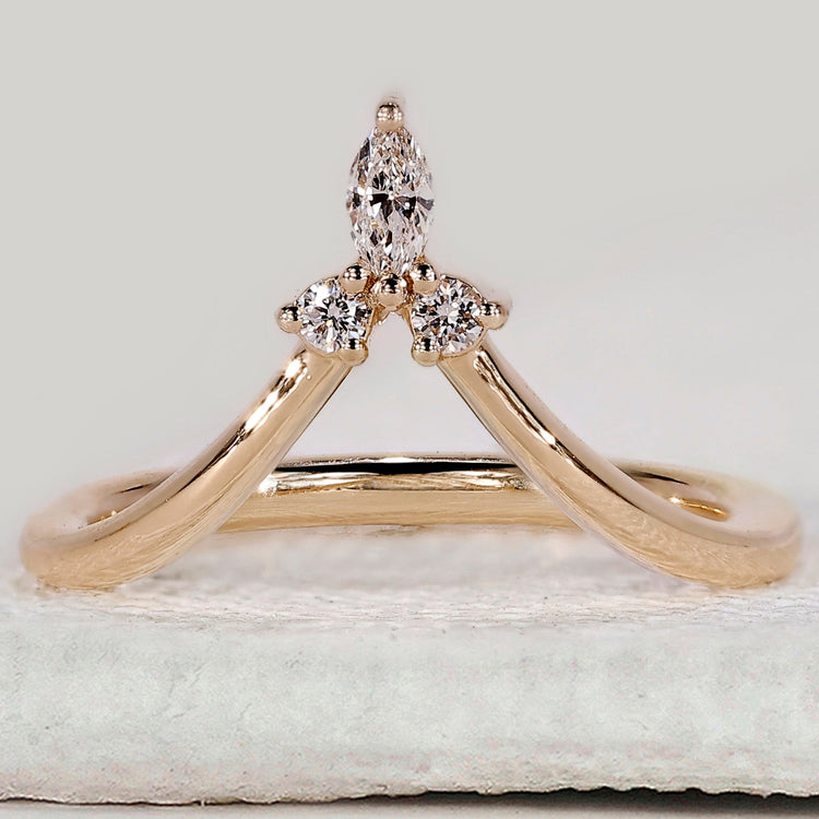 V shaped wedding band in yellow gold.
