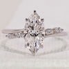 Marquise cut engagement ring in white gold.
