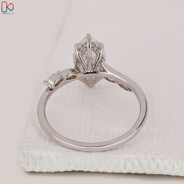 Handmade white gold hidden halo engagement ring.

