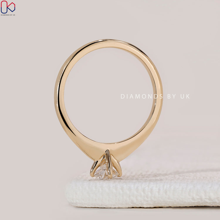 Custom diamond ring handcrafted in yellow gold.
