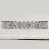 Princess and baguette diamond band in white gold.
