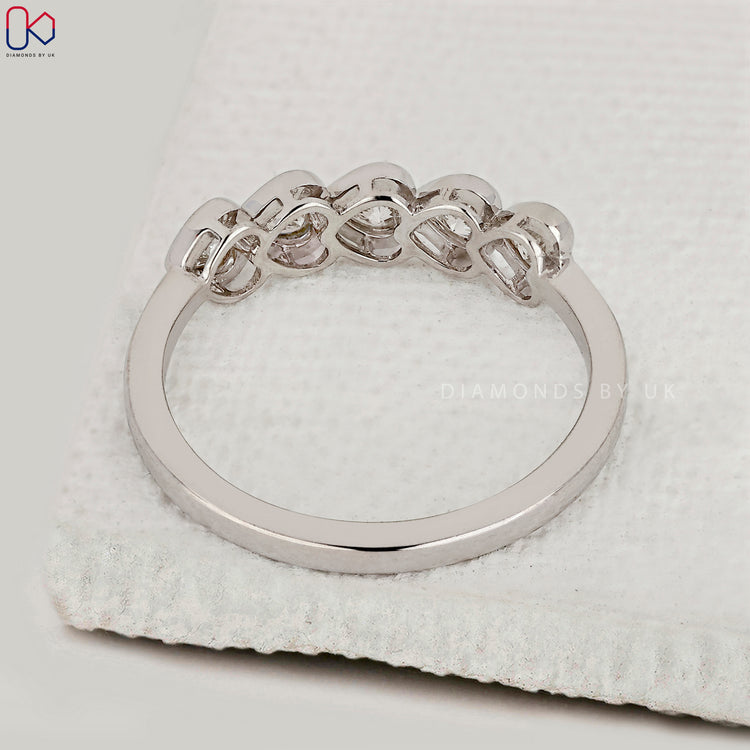 Handmade jewellery white gold diamond band.
