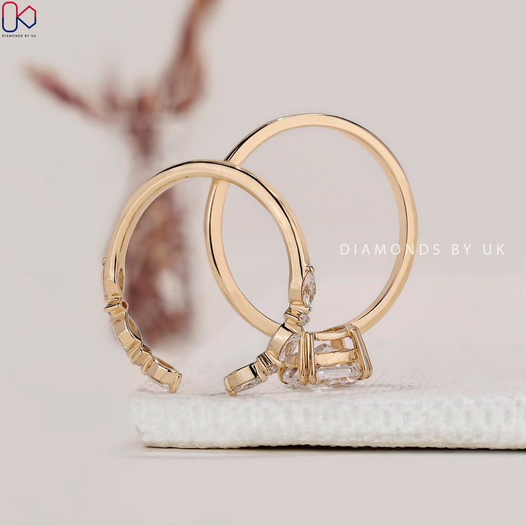 Shared prong wedding band featuring diamonds along the band.
