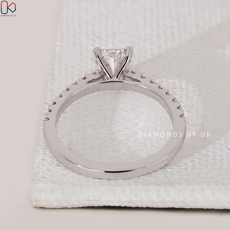 White gold cathedral setting engagement ring.

