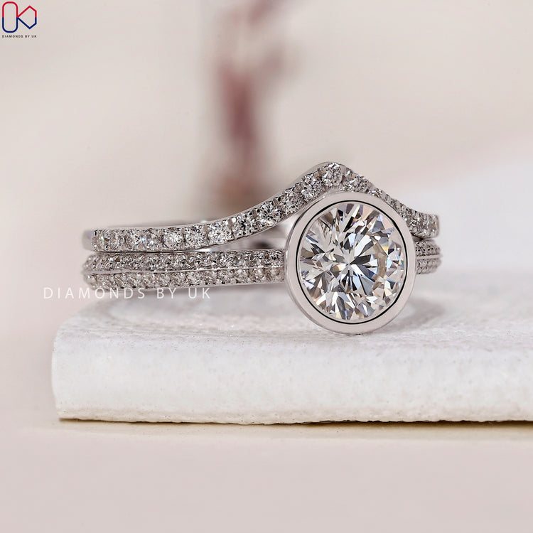 Two sided pave set engagement ring with a dazzling diamond finish.
