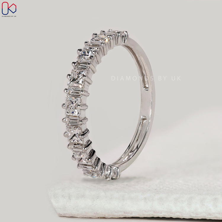 Custom diamond band with princess and baguette diamonds.
