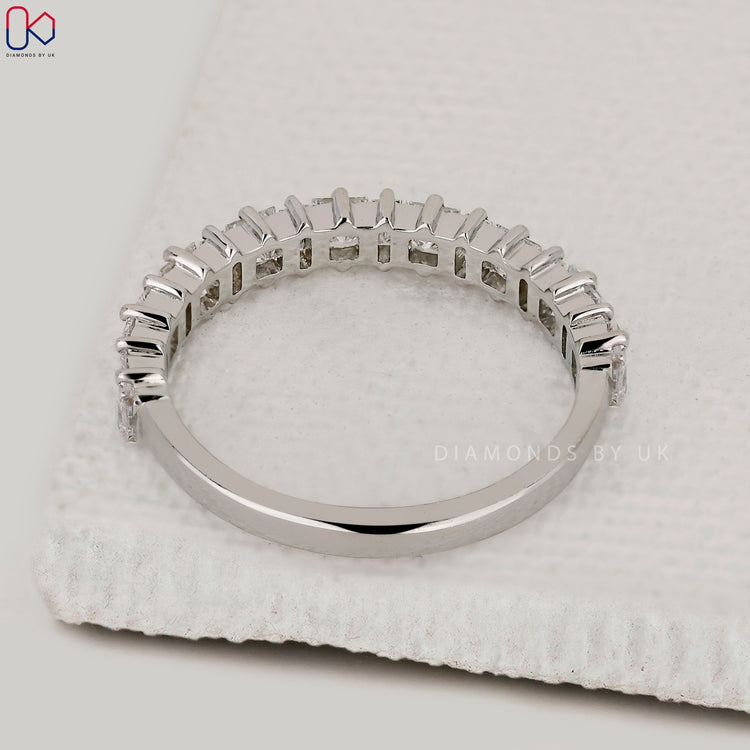 Diamondsbyuk wedding band in white gold.
