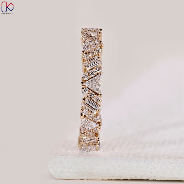 Half eternity yellow gold band with diamonds.
