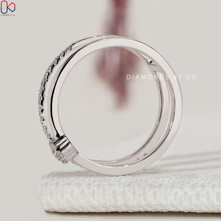 Lab grown round diamond wedding band with handmade style.