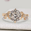 Portuguese cut diamond ring with marquise and round side stones
