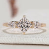 Princess cut diamond ring with three stone style setting.
