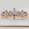 Princess cut ring with round and princess side stones.

