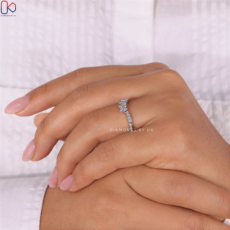 White gold diamond wedding band featuring a tiara design for added brilliance.
