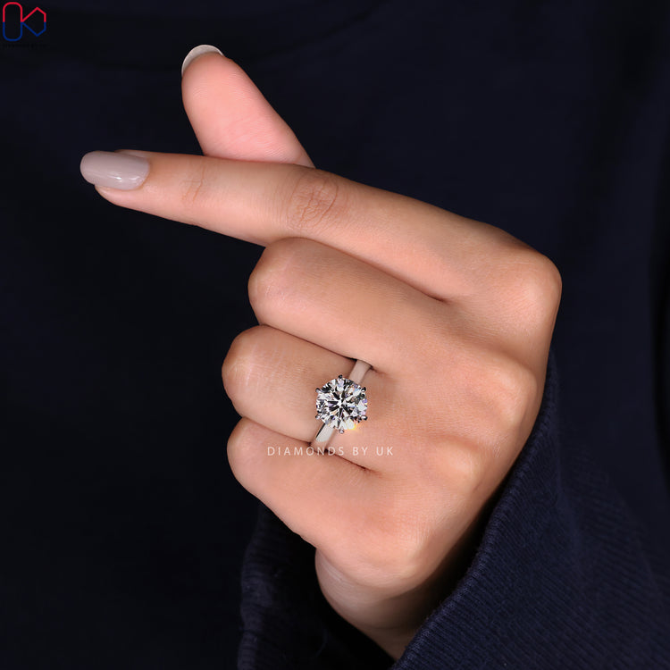 Diamondsbyuk engagement ring featuring a round diamond in a white gold 6 prong setting.