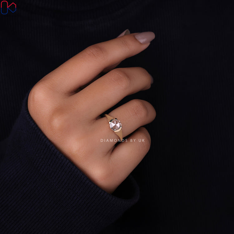 Diamondsbyuk ring with a round rose cut diamond for timeless appeal.